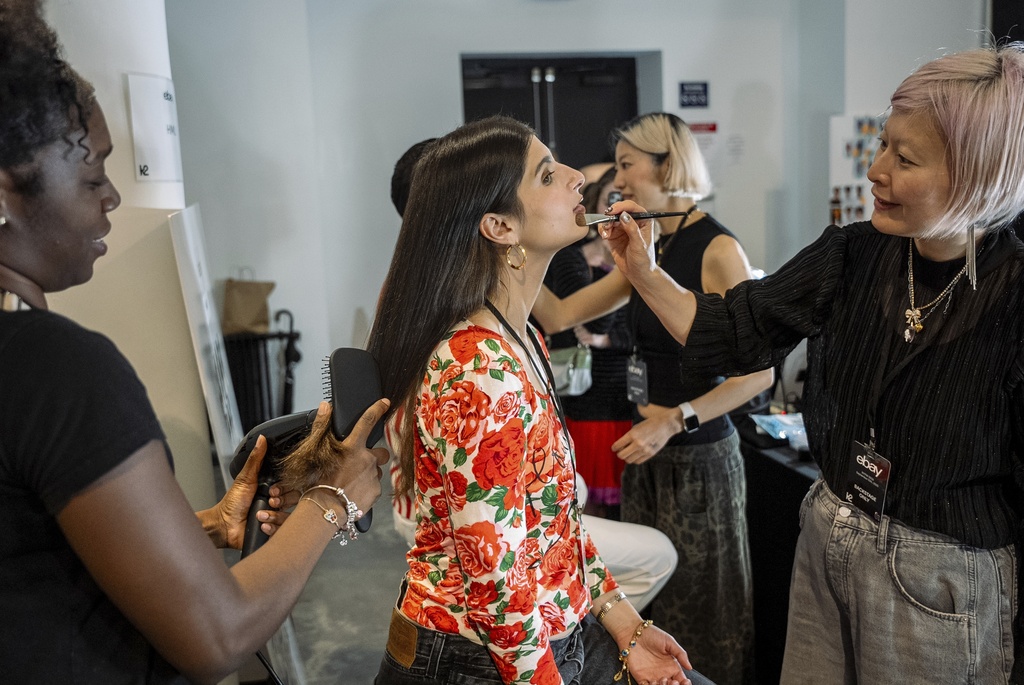 Liana Satenstein prepares for the eBay Endless Runway show during New York Fashion Week, Wednesday, Sept. 10, 2025, in New York. (AP Photo/Angelina Katsanis)