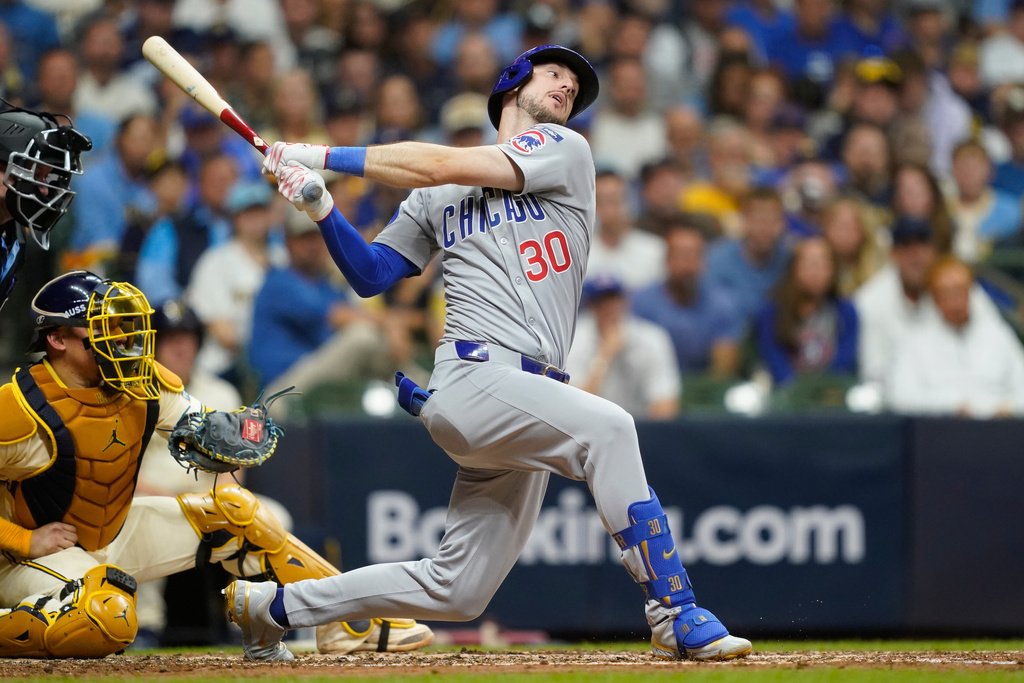 Chicago Cubs' Kyle Tucker (30) strikes out during the fifth inning of Game 2 of baseball's National League Division Series against the Milwaukee Brewers Monday, Oct. 6, 2025, in Milwaukee. (AP Photo/Kayla Wolf)