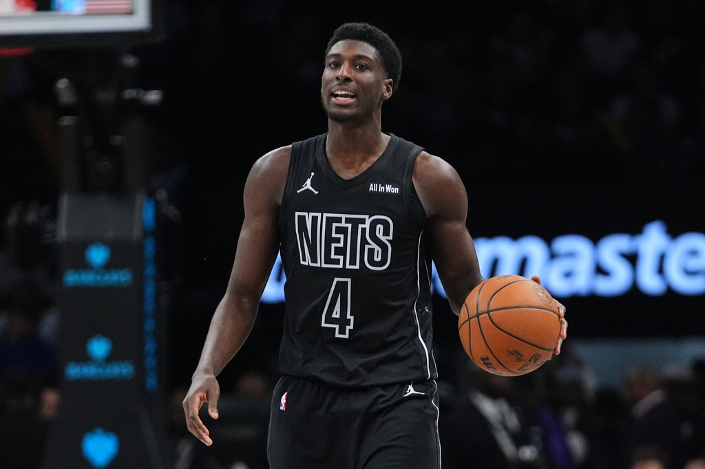 Brooklyn Nets' Drake Powell (4) looks to pass during the second half of an NBA basketball game against the Charlotte Hornets Tuesday, March 31, 2026, in New York. (AP Photo/Frank Franklin II)
