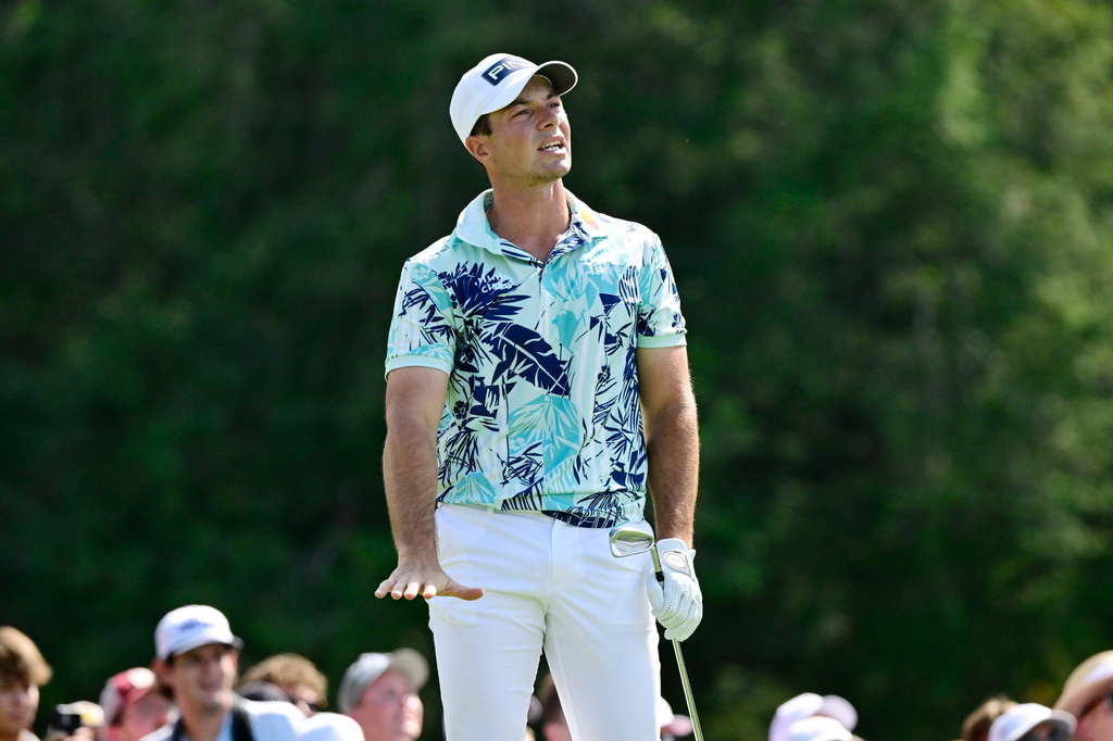 Viktor Hovland, of Norway, reacts to his shot at the fifth hole during the final round of the Travelers Championship golf tournament at TPC River Highlands, Sunday, June 28, 2026, in Cromwell, Conn. (AP Photo/Jessica Hill)