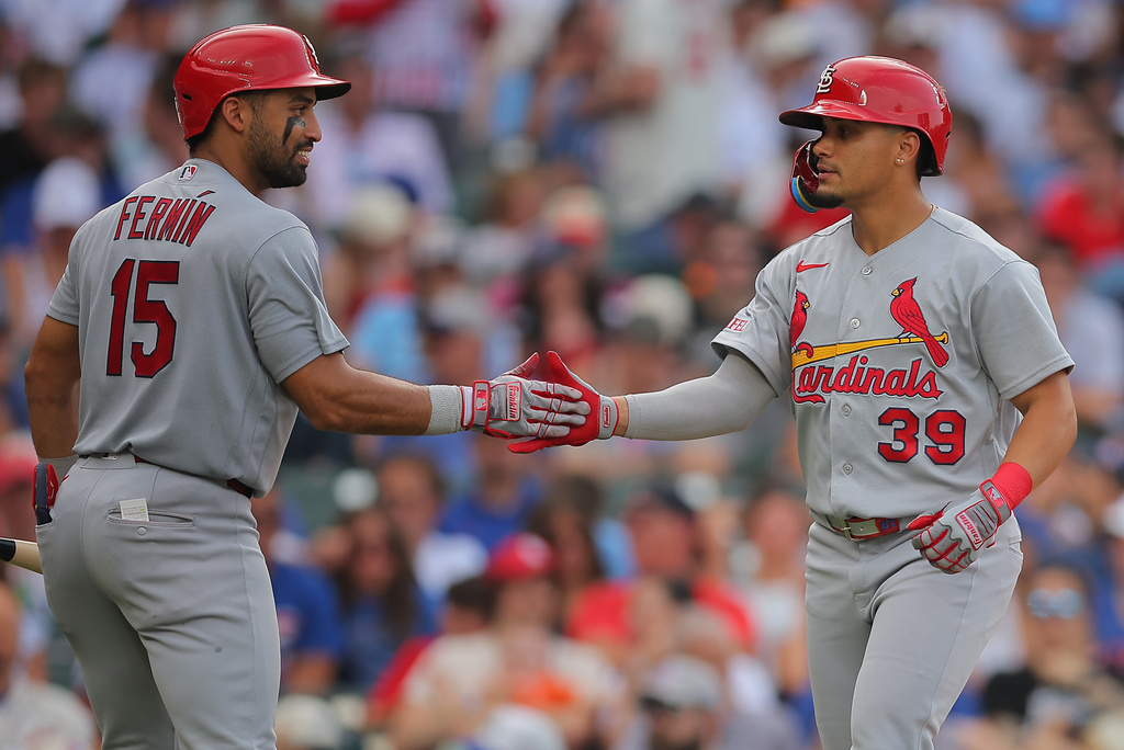 St. Louis Cardinals' Bryan Torres (39 celebrates after hitting a home run with José Fermín (15) during the seventh inning of a baseball game against the Chicago Cubs, Friday, July 3, 2026, in Chicago. (AP Photo/Melissa Tamez)