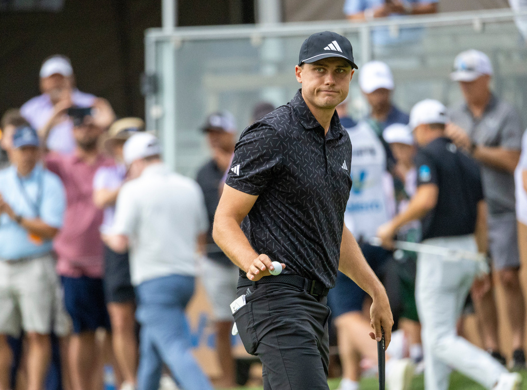Ludvig Aberg waves to fans during the second round of the Valero Texas Open golf tournament in San Antonio, Friday, April 3, 2026. (Andrew J. Whitaker/The San Antonio Express-News via AP)