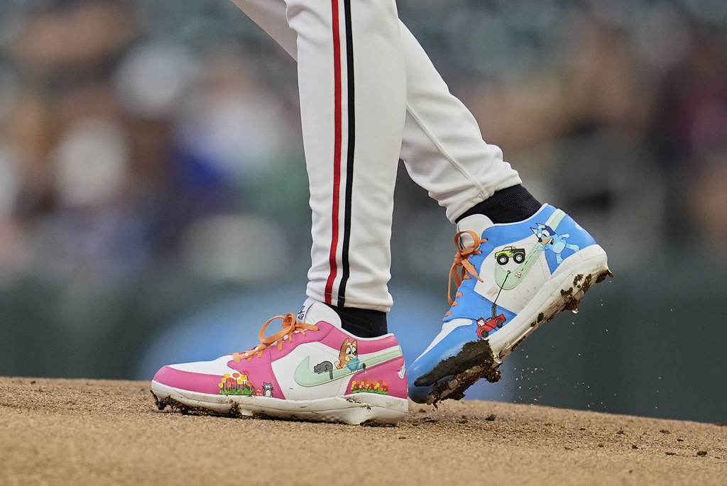 The cleats worn by Minnesota Twins starting pitcher Bailey Ober (17) are pictured during the first inning of a baseball game against the Detroit Tigers Thursday, Aug. 14, 2025, in Minneapolis. (AP Photo/Abbie Parr)