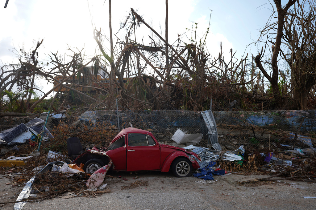 FILE - The Hotel Flamingo is surrounded by debris in the aftermath of Hurricane Otis, in Acapulco, Mexico, Friday, Nov. 10, 2023. (AP Photo/Marco Ugarte, File)