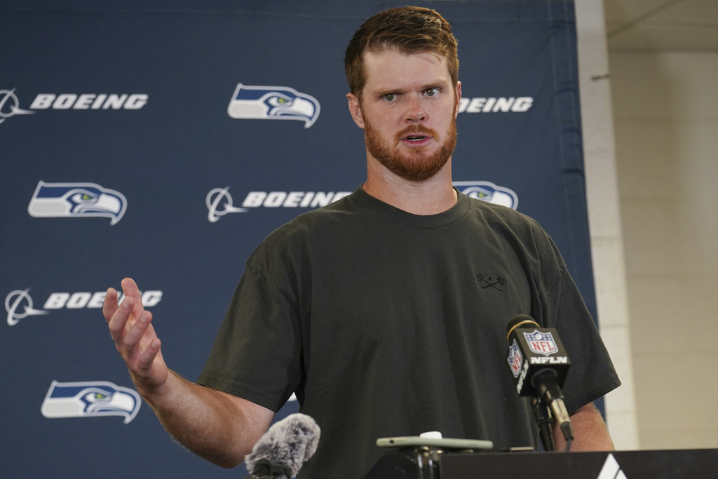 Seattle Seahawks quarterback Sam Darnold speaks during a news conference after an NFL football game against the Pittsburgh Steelers, Sunday, Sept. 14, 2025, in Pittsburgh. (AP Photo/Matt Freed)