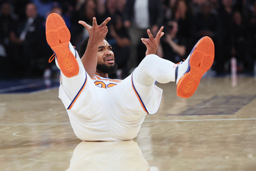 New York Knicks' Karl-Anthony Towns gestures after scoring a three-point basket and drawing a foul during the first half of an NBA basketball game against the Boston Celtics, Friday, Oct. 24, 2025, in New York. (AP Photo/Heather Khalifa) New York Knicks' Karl-Anthony Towns gestures after scoring a three-point basket and drawing a foul during the first half of an NBA basketball game against the Boston Celtics, Friday, Oct. 24, 2025, in New York. (AP Photo/Heather Khalifa)