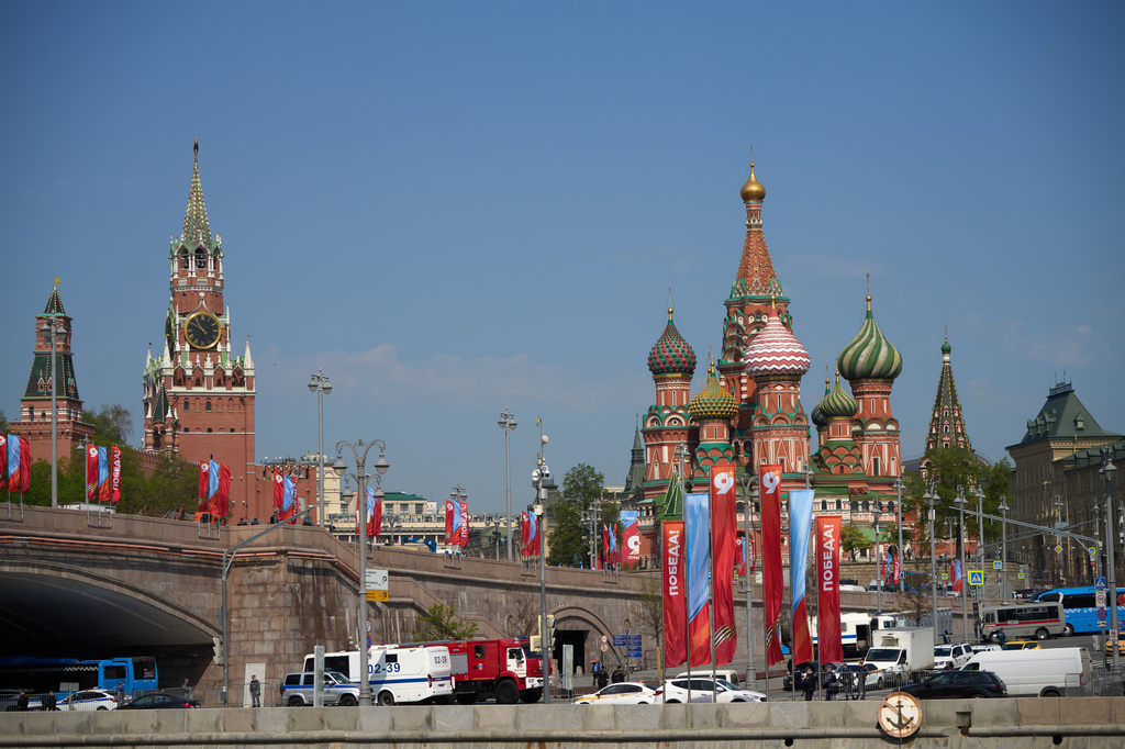 Special service vehicles are parked near Red Square decorated for the celebrations of the 81st anniversary of the Soviet Union's victory over Nazi Germany at World War II during the Victory Day military parade rehearsal in Moscow, Russia, Thursday, May 7, 2026, backdropped by the Spasskaya Tower, left, and the St. Basil's Cathedral, right. (AP Photo/Alexander Zemlianichenko)