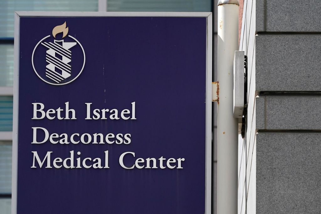 FILE - A sign hangs from the Beth Israel Deaconess Medical Center, Aug. 18, 2022, in Boston. (AP Photo/Charles Krupa, file)