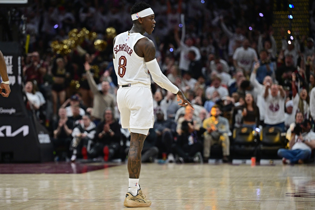 Cleveland Cavaliers guard Dennis Schroder reacts after making a three point basket during the second half in Game 5 of a first-round NBA playoffs basketball series against the Toronto Raptors, Wednesday, April 29, 2026, In Cleveland. (AP Photo/David Dermer)