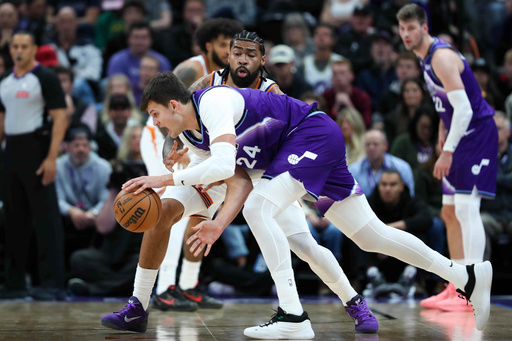 Phoenix Suns center Nick Richards, top, defends against Utah Jazz center Walker Kessler (24) during the first half of an NBA basketball game, Monday, Oct. 27, 2025, in Salt Lake City. (AP Photo/Anna Fuder) Phoenix Suns center Nick Richards, top, defends against Utah Jazz center Walker Kessler (24) during the first half of an NBA basketball game, Monday, Oct. 27, 2025, in Salt Lake City. (AP Photo/Anna Fuder)