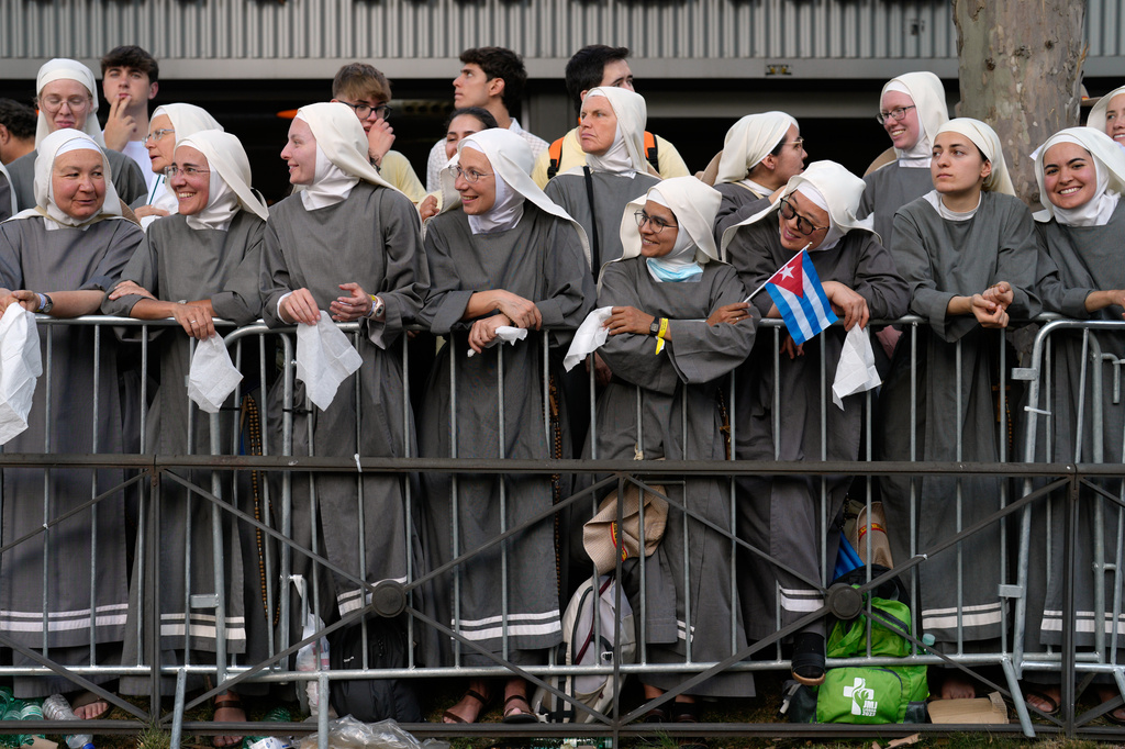 A group of nuns wait for the arrival of Pope Leo XIV during a prayer vigil with young people at Plaza de Lima in Madrid, Spain, Saturday, June 6, 2026, on the first day of his seven-day apostolic visit to mainland Spain and the Canary Islands. (AP Photo/Bernat Armangue)
