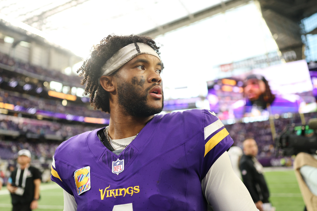 Minnesota Vikings quarterback Kyler Murray walks off the field following an NFL football game against the Miami Dolphins, Sunday, Oct. 4, 2026, in Minneapolis. (AP Photo/Matt Krohn)