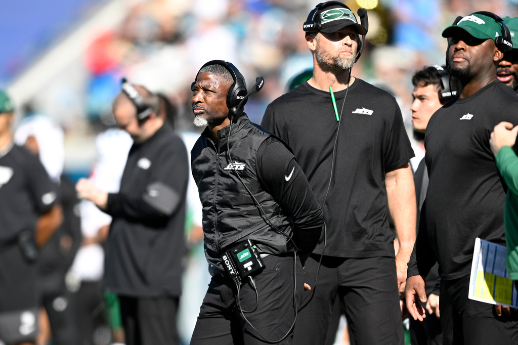 New York Jets head coach Aaron Glenn looks on during the first half against the Jacksonville Jaguars in an NFL football game, Sunday, Dec. 14, 2025, in Jacksonville, Fla. (AP Photo/Phelan M. Ebenhack)