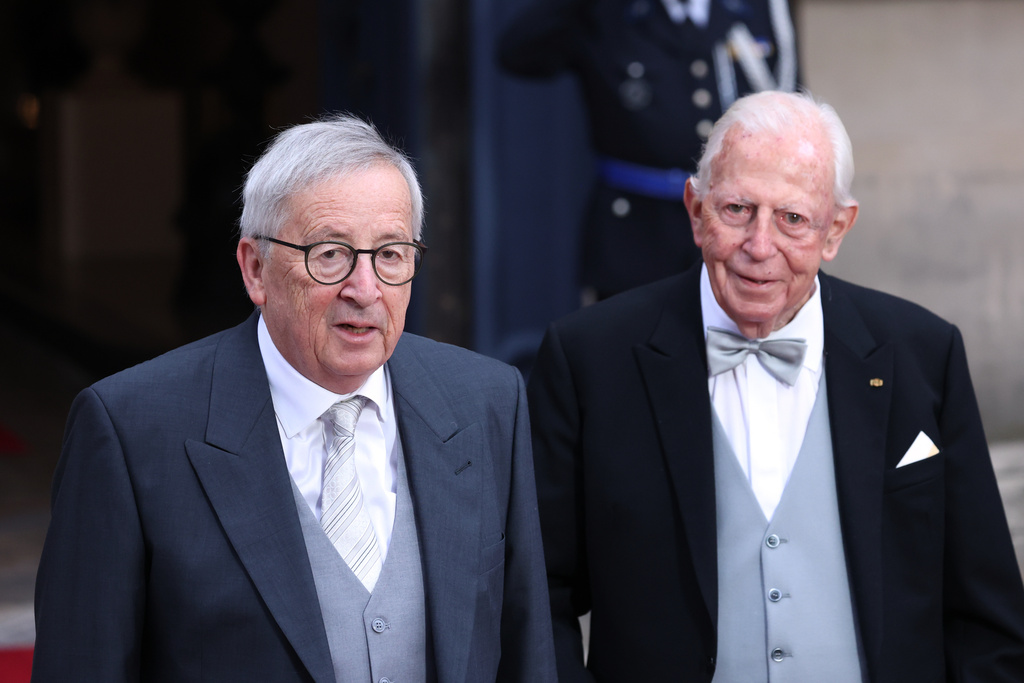 Luxembourg's Honorary Ministers of State Jean-Claude Juncker, left, and Jacques Santer arrive for the abdication and enthronement ceremony of the Grand Duke of Luxembourg at the Grand Ducal Palace in Luxembourg, Friday, Oct. 3, 2025. (AP Photo/Omar Havana)
