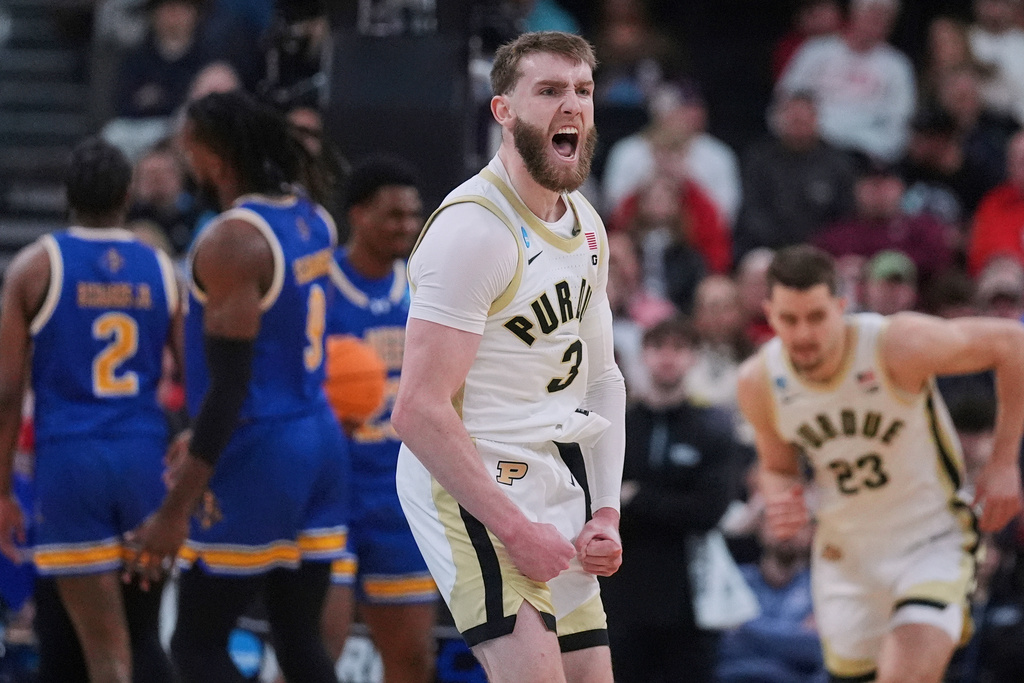 FILE - Purdue guard Braden Smith (3) celebrates while taking a lead against McNeese State during the first half in the second round of the NCAA college basketball tournament, Saturday, March 22, 2025, in Providence, R.I. (AP Photo/Charles Krupa, File)