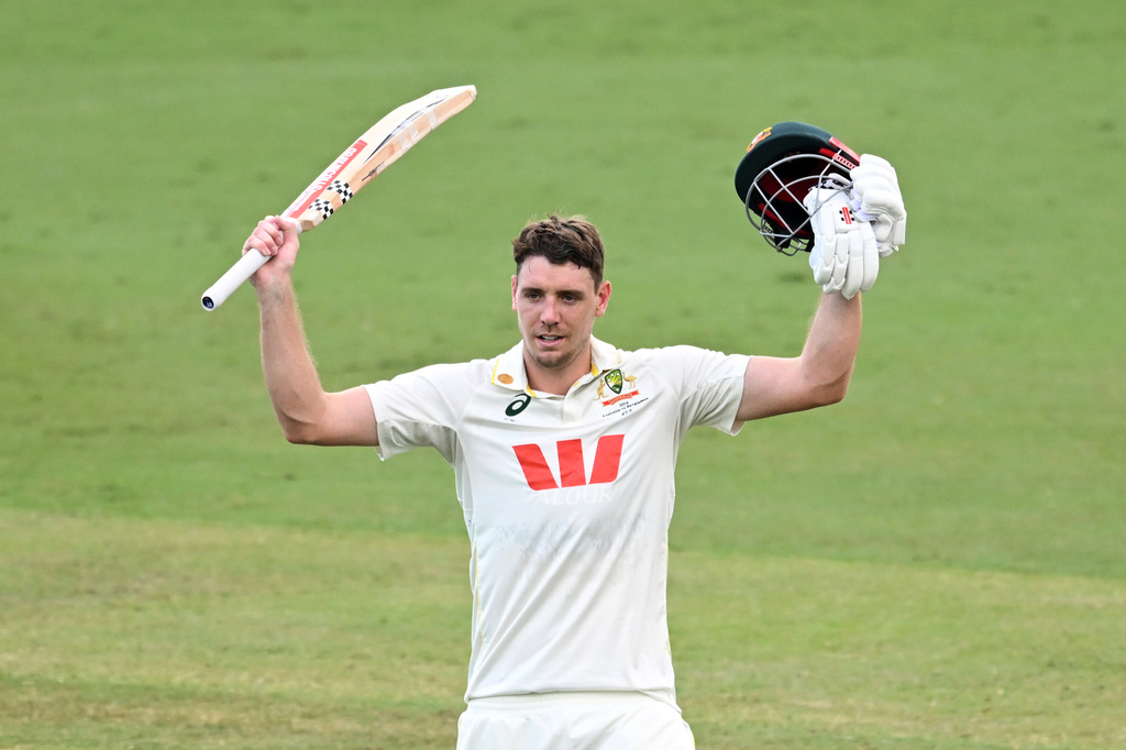 Cameron Green of Australia celebrates after making a century during play on day four of the first cricket test against Bangladesh in Darwin, Australia, Sunday, Aug. 16, 2026. (James Ross/AAP Image via AP)