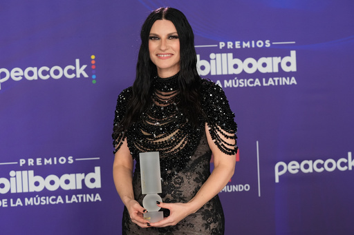 Laura Pausini poses with the Icon Award at the Latin Billboard Awards Thursday, Oct. 23, 2025, in Miami. (AP Photo/Marta Lavandier) Laura Pausini poses with the Icon Award at the Latin Billboard Awards Thursday, Oct. 23, 2025, in Miami. (AP Photo/Marta Lavandier)
