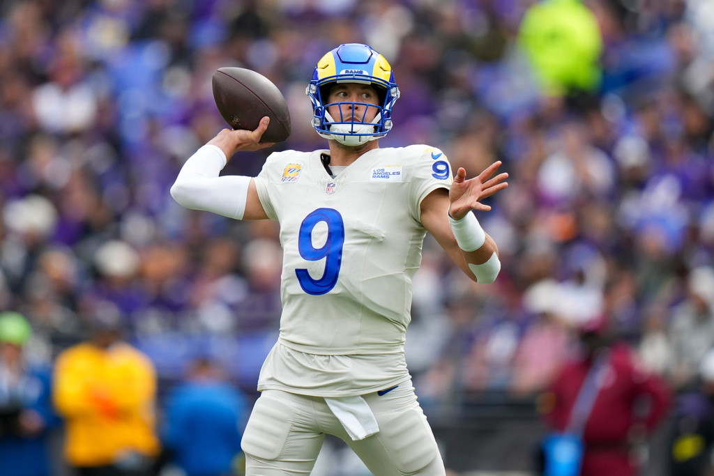 Los Angeles Rams quarterback Matthew Stafford throws a pass against the Baltimore Ravens during the first half of an NFL football game Sunday, Oct. 12, 2025, in Baltimore. (AP Photo/Stephanie Scarbrough)