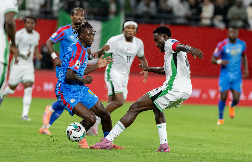 Congo's Ngal'ayel Mukau challenges Nigeria's Wilfred Ndidi during the World Cup African qualifier soccer match between Congo and Nigeria, in Rabat, Morocco, Sunday, Nov. 16, 2025. (AP Photo)