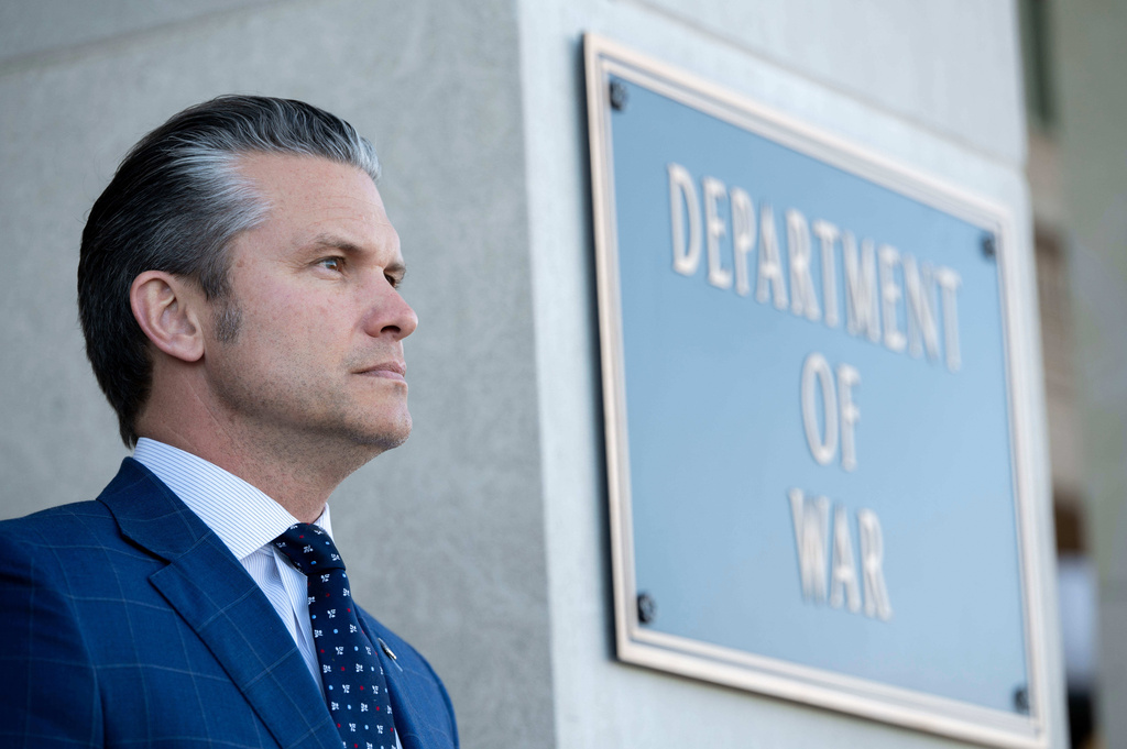 Defense Secretary Pete Hegseth stands outside the Pentagon during a welcome ceremony for Japanese Defense Minister Shinjirō Koizumi at the Pentagon, Thursday, Jan. 15, 2026 in Washington. (AP Photo/Kevin Wolf/)