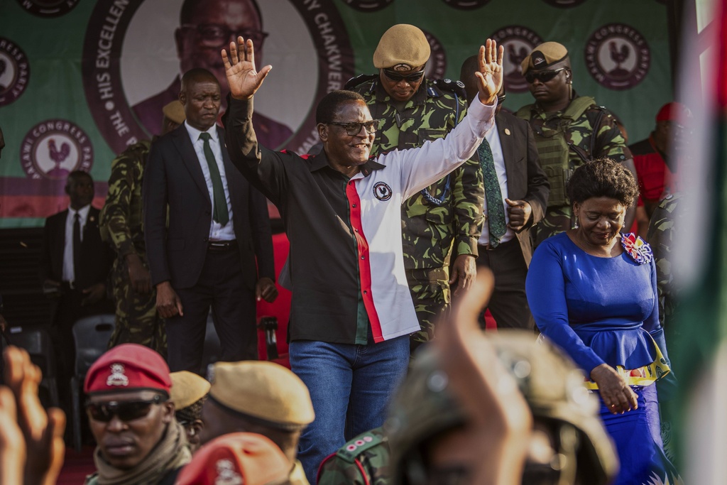 Malawi Congress Party (MCP) leader and Malawian President Lazarus Chakwera waves at supporters at a campaign rally in Blantyre, Malawi, Sunday, Sept. 7, 2025. (AP Photo/Thoko Chikondi)
