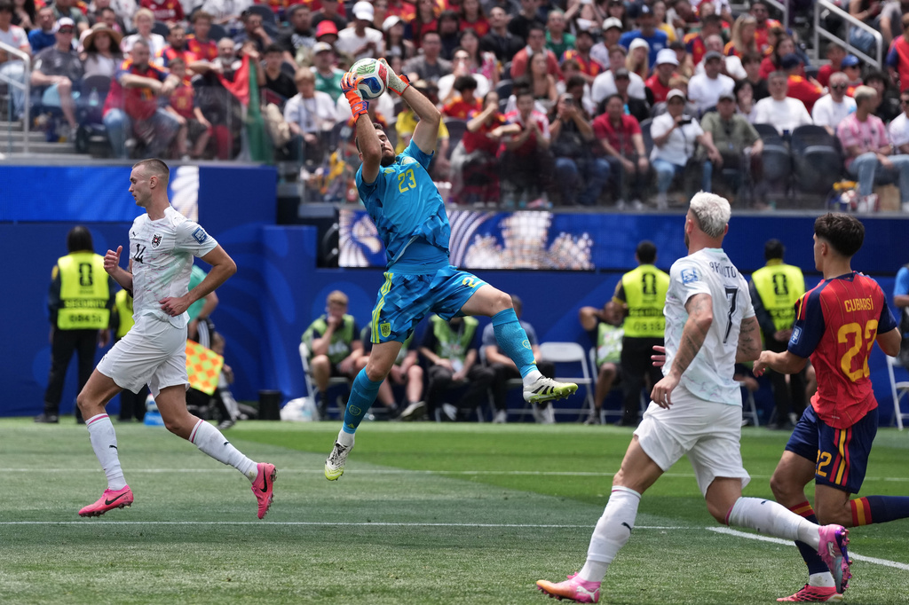 Spain goalkeeper Unai Simon (23) makes a save during the World Cup round of 32 soccer match between Spain and Austria in Inglewood, Calif., near Los Angeles, Thursday, July 2, 2026. (AP Photo/Jae C. Hong)