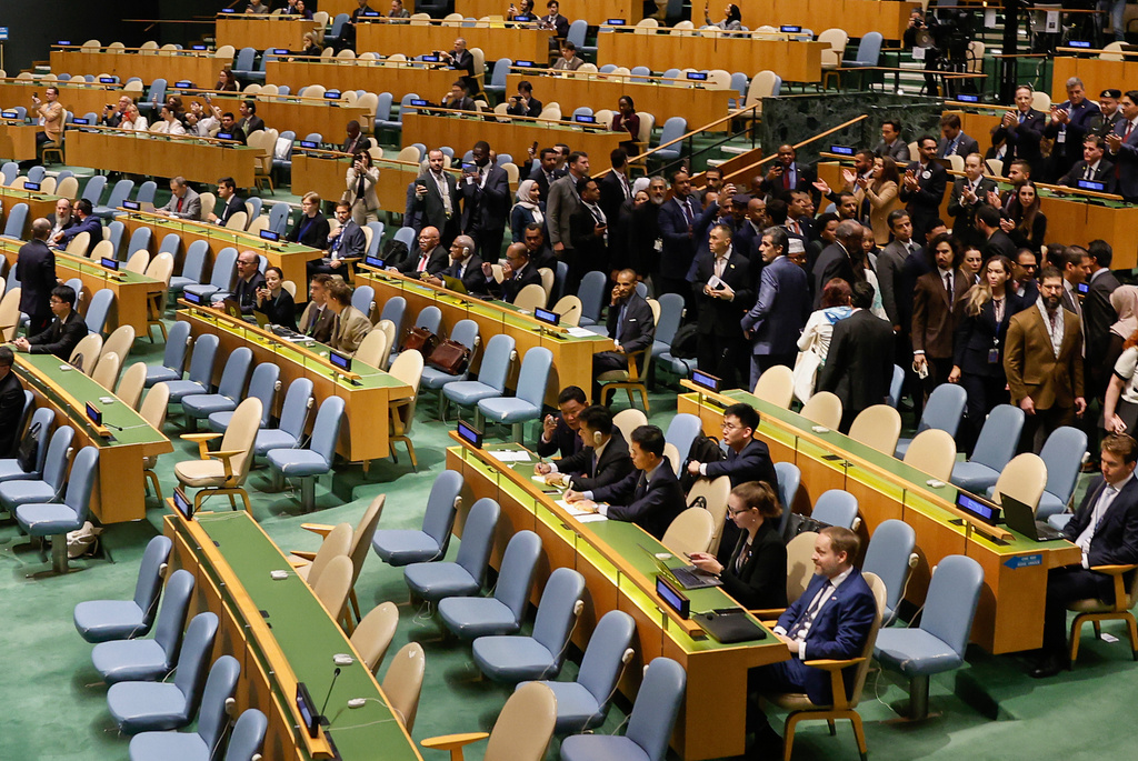 Delegates leave the General Assembly hall as Israeli Prime Minister Benjamin Netanyahu steps up to the podium to speak at the 80th session of the United Nations General Assembly, Friday, Sept. 26, 2025, at U.N. headquarters. (AP Photo/Stefan Jeremiah)