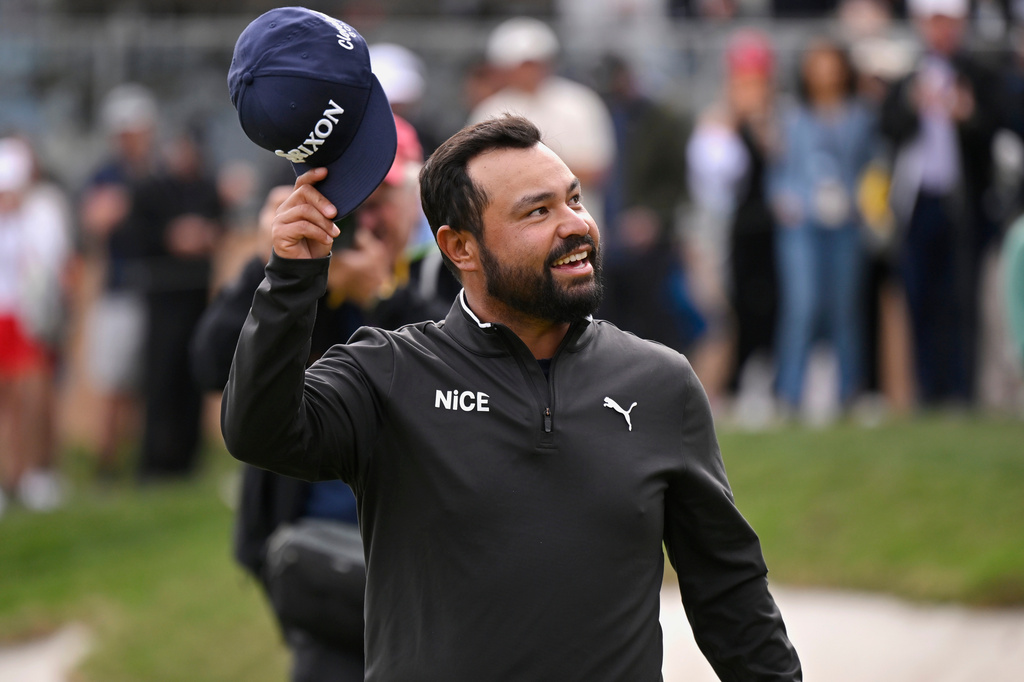 J.J. Spaun waves to fans after winning the Valero Texas Open golf tournament in San Antonio, Sunday, April 5, 2026. (AP Photo/Darren Abate)