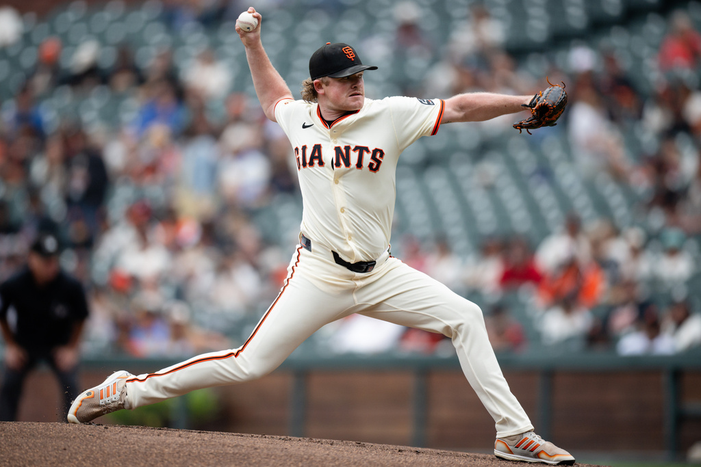 San Francisco Giants starting pitcher Logan Webb throws against the Colorado Rockies during the first inning of a baseball game, Sunday, Sept. 28, 2025, in San Francisco. (AP Photo/Thien-An Truong)