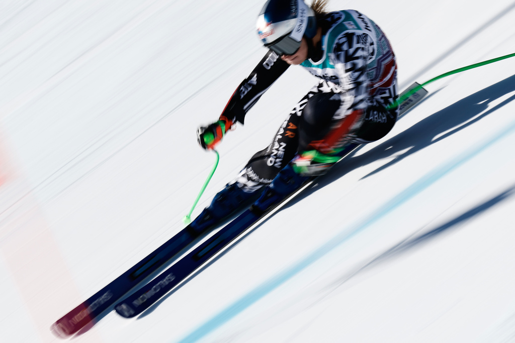 New Zealand's Alice Robinson speeds down the course during an alpine ski, women's World Cup super-G event, in St. Moritz, Switzerland, Sunday Dec. 14, 2025. (AP Photo/Gabriele Facciotti)