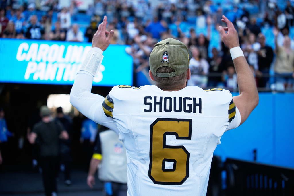 New Orleans Saints quarterback Tyler Shough celebrates after their win against the Carolina Panthers in an NFL football game, Sunday, Nov. 9, 2025, in Charlotte, N.C. (AP Photo/Jacob Kupferman)