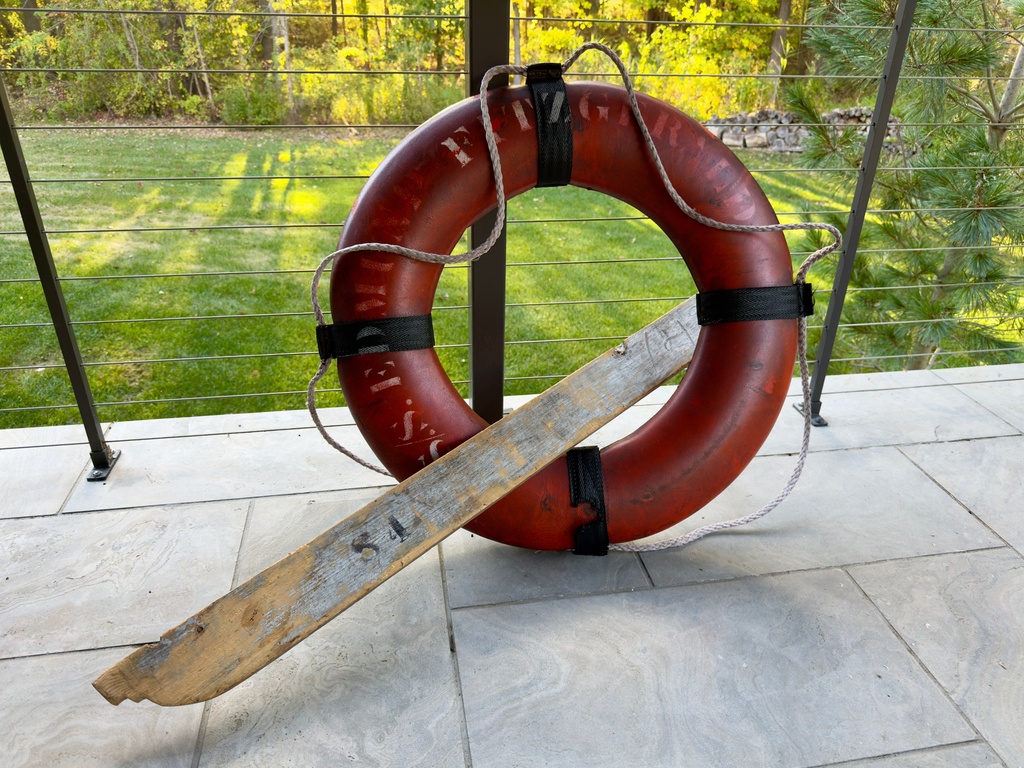FILE - A rare life ring from the 1975 shipwreck of the Edmund Fitzgerald obtained by the state of Michigan in a lawsuit settlement is displayed on Oct. 12, 2025, outside Detroit. (Randal Smith via AP, File)