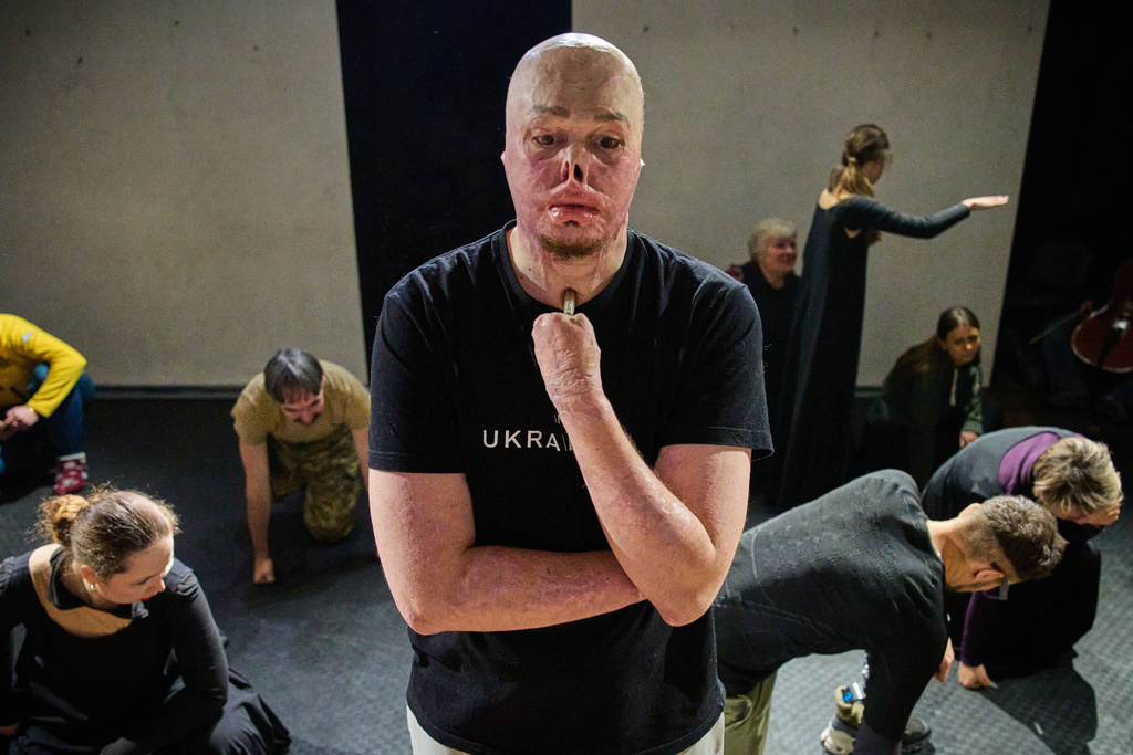 Yehor Babenko, a war veteran who sustained severe injuries in combat during Russia's full-scale invasion in Ukraine, performs during rehearsal in Kyiv, Ukraine, Wednesday, Feb. 18, 2026. (AP Photo/Efrem Lukatsky)