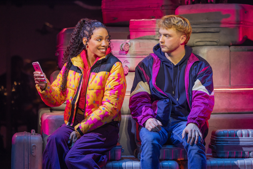 Christiani Pitts, left, and Sam Tutty appear during a performance of "Two Strangers" in New York on Oct. 31, 2025. (Matthew Murphy via AP)