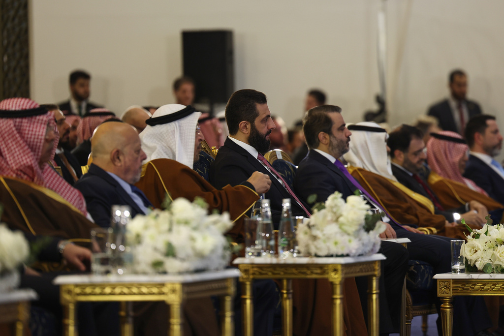 Syrian interim President Ahmad al-Sharaa attends a signing ceremony of strategic agreements between Syria and Saudi Arabia at the People's Palace in Damascus, Syria, Saturday, Feb. 7, 2026. (AP Photo/Ghaith Alsayed)