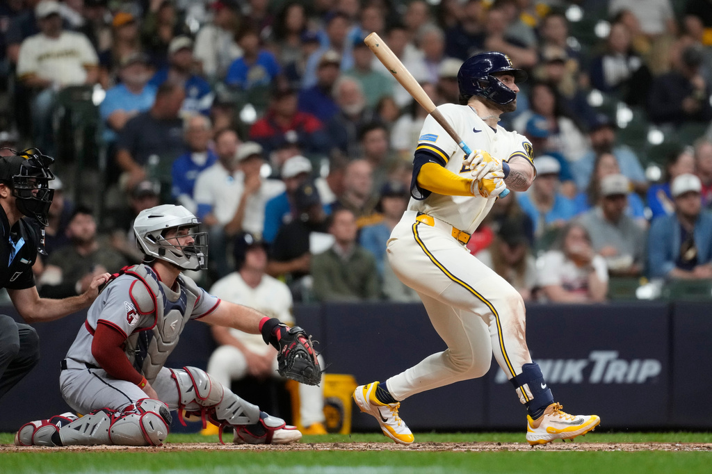 Milwaukee Brewers' Garrett Mitchell hits a solo home run during the seventh inning of a baseball game against the Cleveland Guardians, Tuesday, June 16, 2026, in Milwaukee. (AP Photo/Aaron Gash)