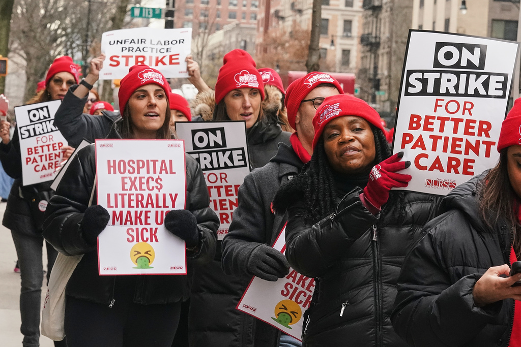 Striking nurses demonstrate outside Mt. Sinai Morningside Hospital, in New York, Wednesday, Jan. 14, 2026. (AP Photo/Richard Drew)