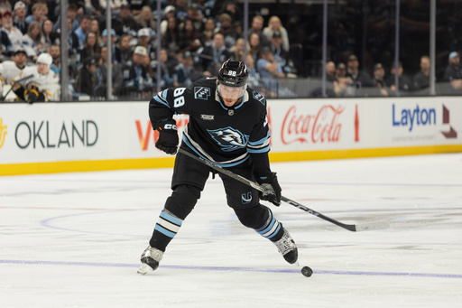Utah Mammoth defense Nate Schmidt shoots the puck against the Boston Bruins during the second period of an NHL hockey game Sunday, Oct. 19, 2025, in Salt Lake City. (AP Photo/Melissa Majchrzak) Utah Mammoth defense Nate Schmidt shoots the puck against the Boston Bruins during the second period of an NHL hockey game Sunday, Oct. 19, 2025, in Salt Lake City. (AP Photo/Melissa Majchrzak)