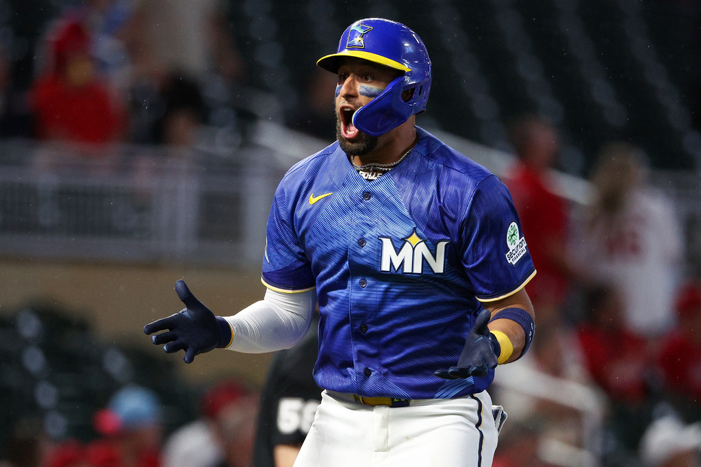 Minnesota Twins' Royce Lewis celebrates his solo home run against the St. Louis Cardinals during the eighth inning of a baseball game, Friday, June 12, 2026, in Minneapolis. (AP Photo/Matt Krohn)