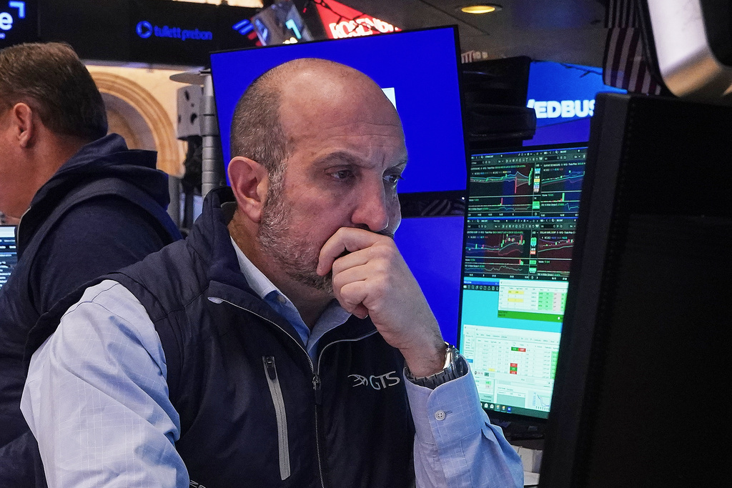 Specialist James Denaro works at his post on the floor of the New York Stock Exchange, Thursday, Jan. 8, 2026. (AP Photo/Richard Drew)