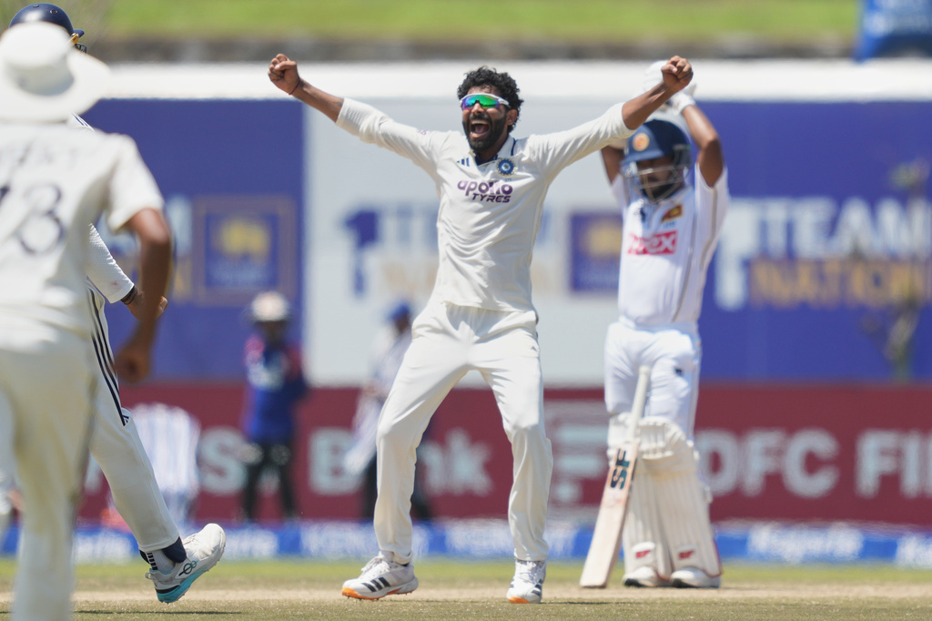 India's Ravindra Jadeja celebrates the dismissal of Sri Lanka's captain Dhananjaya de Silva during the day five of the first cricket test match between Sri Lanka and India in Galle, Sri Lanka, Wednesday, Aug. 19, 2026. (AP Photo/Eranga Jayawardena)