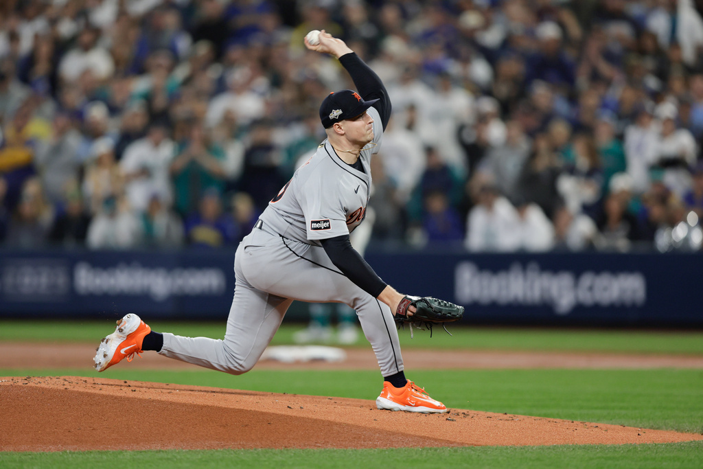 Detroit Tigers pitcher Tarik Skubal throws during the first inning in Game 5 of baseball's American League Division Series against the Seattle Mariners, Friday, Oct. 10, 2025, in Seattle. (AP Photo/John Froschauer)