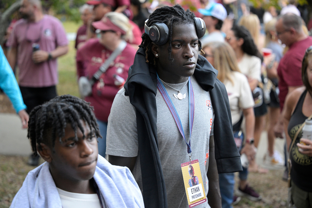 FILE - Seminole linebacker Ethan Pritchard walks to the stadium before an NCAA college football game between Florida State and Duke, Oct. 21, 2023, in Tallahassee, Fla. (AP Photo/Phelan M. Ebenhack, file)