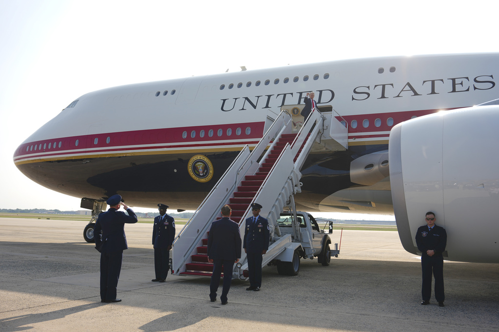 President Donald Trump boards Air Force One, Wednesday, July 1, 2026, at Joint Base Andrews, Md. (AP Photo/Julia Demaree Nikhinson)