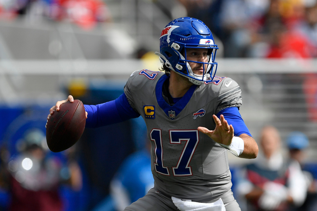 Buffalo Bills quarterback Josh Allen looks to pass during the first half of an NFL football game against the Los Angeles Chargers, Sunday, Sept. 27, 2026, in Orchard Park, N.Y. (AP Photo/Adrian Kraus)