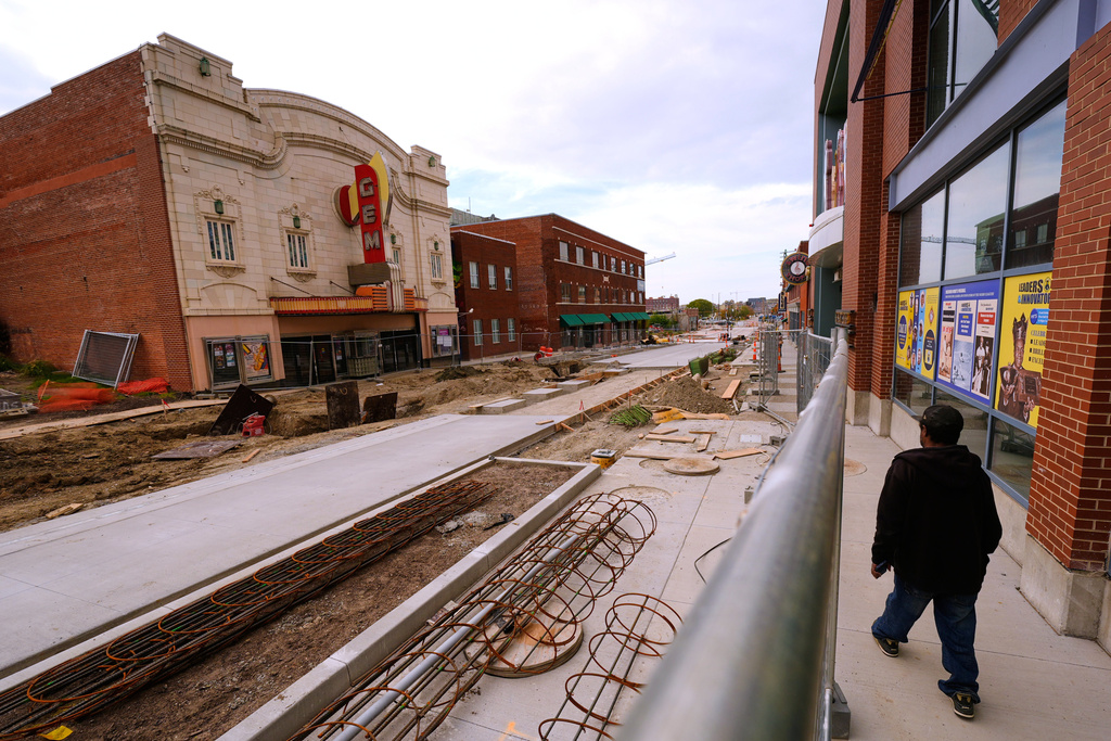A man walks through the 18th and Vine district as street renovations are ongoing, Thursday, Nov. 6, 2025, in Kansas City, Mo. (AP Photo/Charlie Riedel)
