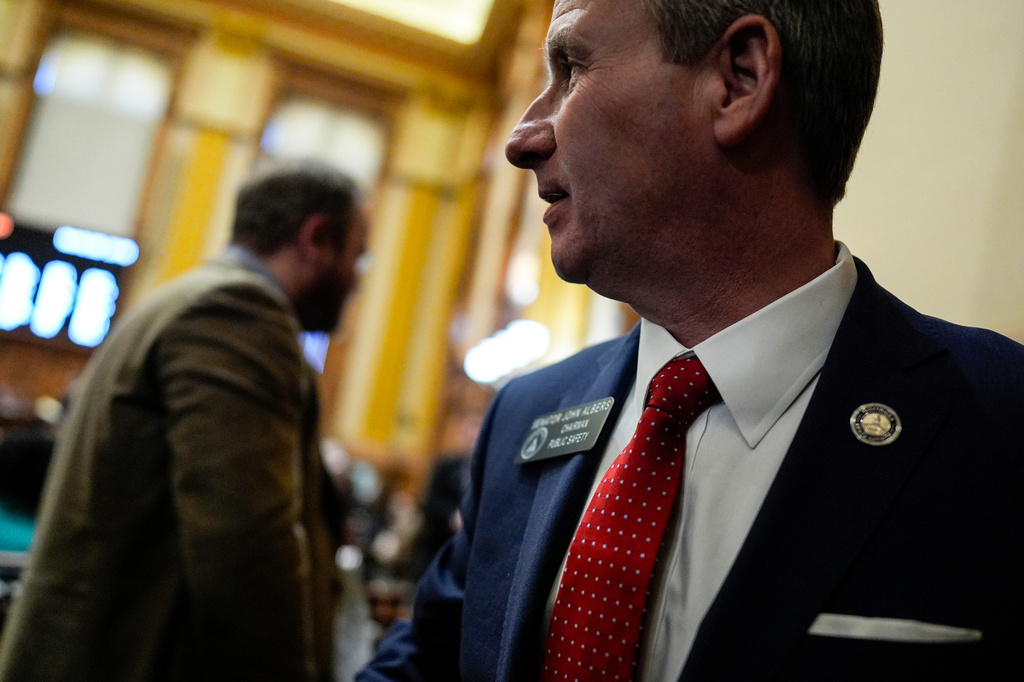 FILE - Sen. John Albers walks on the Senate floor inside the state capitol, March 6, 2025, in Atlanta. (AP Photo/Mike Stewart, File)