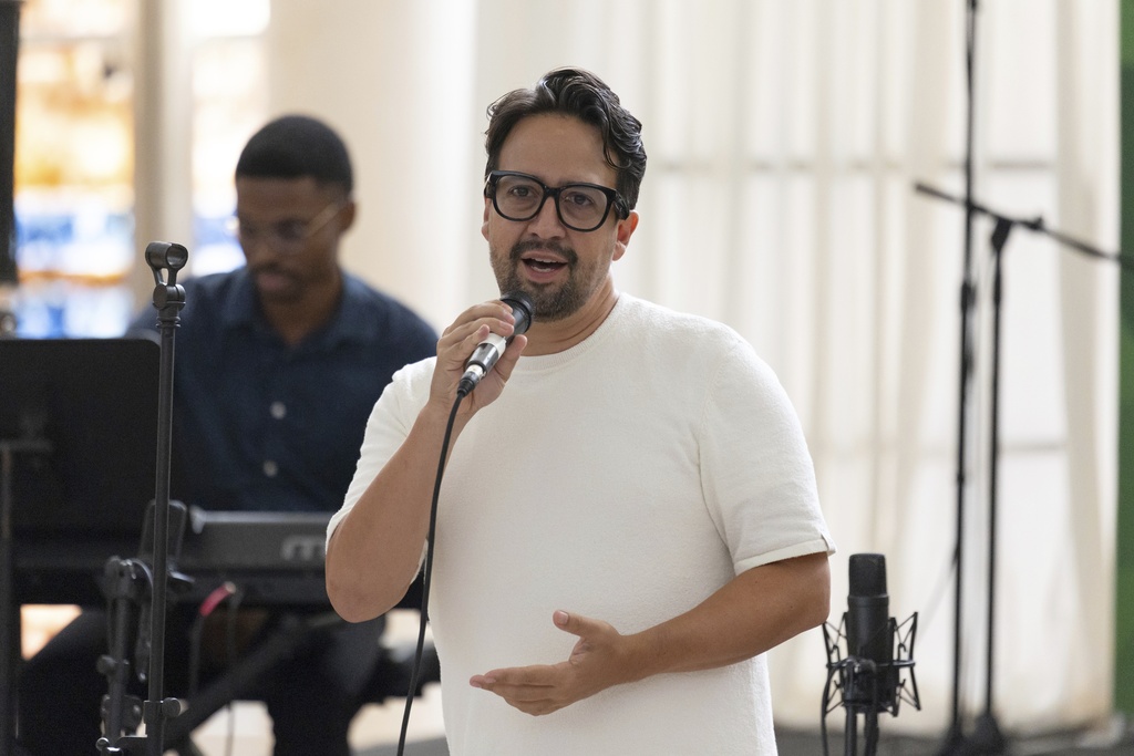 Lin-Manuel Miranda speaks to attendees during the closing event of the Flamboyan Arts Fund at the Museum of Contemporary Art in San Juan, Puerto Rico, Saturday, Sept. 13, 2025. (AP Photo/Alejandro Granadillo)