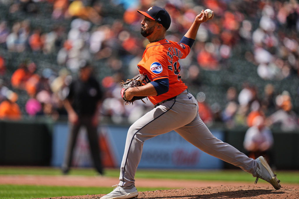 Houston Astros pitcher Jason Alexander delivers during the seventh inning in the first baseball game of a doubleheader against the Baltimore Orioles, Thursday, April 30, 2026, in Baltimore. (AP Photo/Stephanie Scarbrough)
