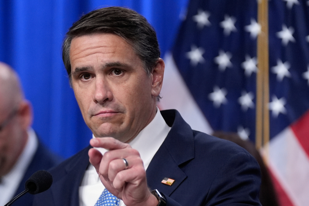 FILE - Acting Attorney General Todd Blanche speaks during a news conference on unaccompanied children at the Justice Department, June 11, 2026, in Washington. (AP Photo/Manuel Balce Ceneta, File)